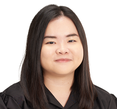 a woman with dark hair wearing a black shirt